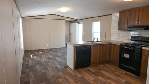 Kitchen at 31 blue water Drive, Cicero, IN — Updated kitchen with island and granite countertops.