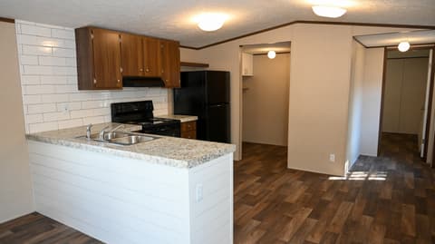 Kitchen at 31 blue water Drive, Cicero, IN — Renovated kitchen with granite island and modern updates