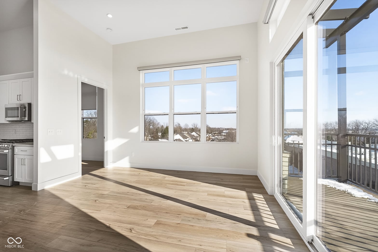 Soaring windows frame expansive views with seamless indoor-outdoor flow.