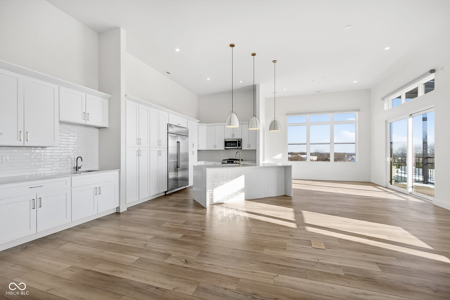 Light-filled open kitchen with premium finishes and panoramic views.