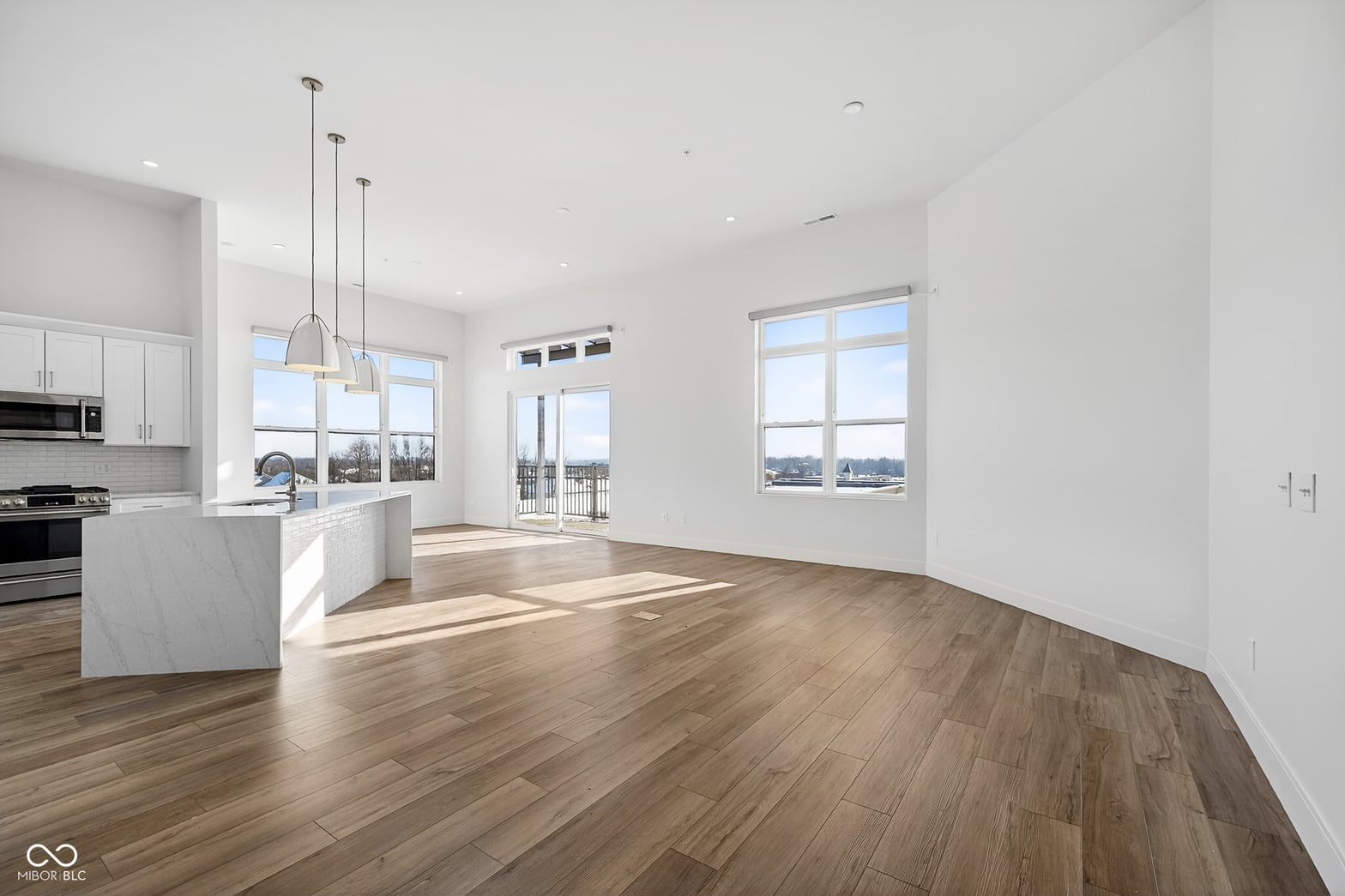 Bright, open living space with sweeping waterfront views and premium finishes.