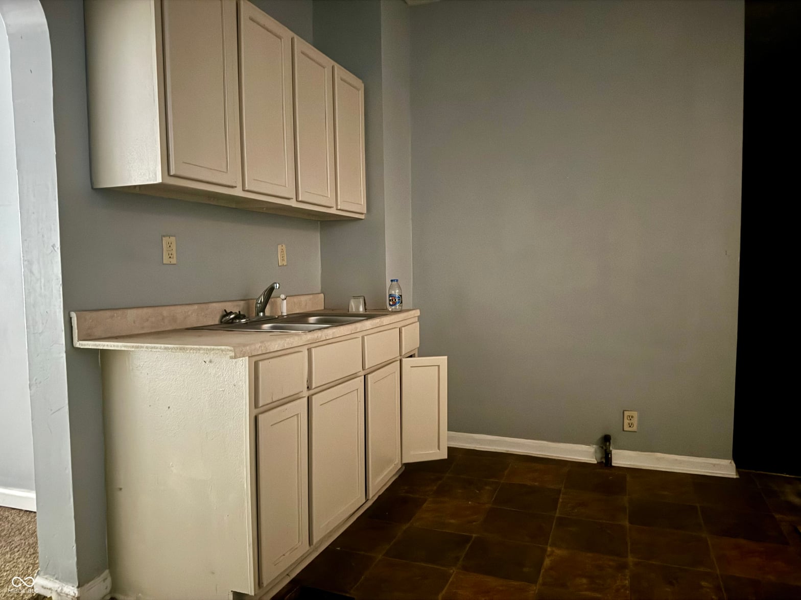 Kitchen at 642 N Oxford Street, Indianapolis, IN — Functional kitchen with ample cabinetry and storage space.