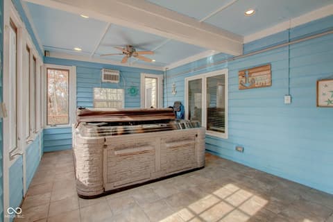 Outdoor living area at 303 Wellington Overlook, Noblesville, IN — Charming coastal outdoor kitchen with built-in grill.
