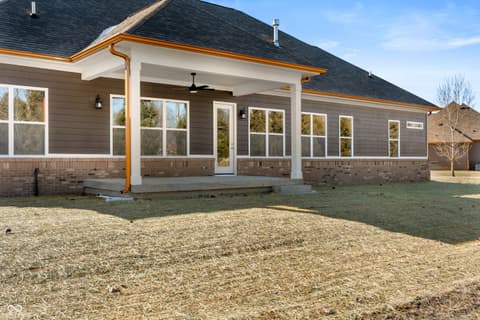 Backyard at 4248 Stone Lake Drive, Zionsville, IN — New construction home with spacious covered patio.