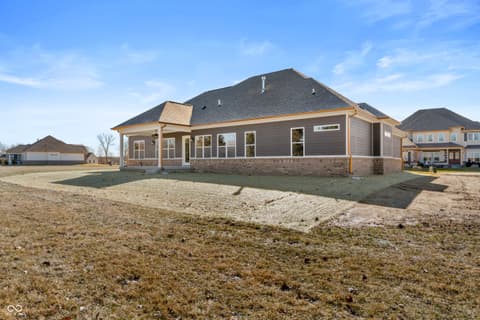 Front exterior at 4248 Stone Lake Drive, Zionsville, IN — Spacious new construction home with covered porch.