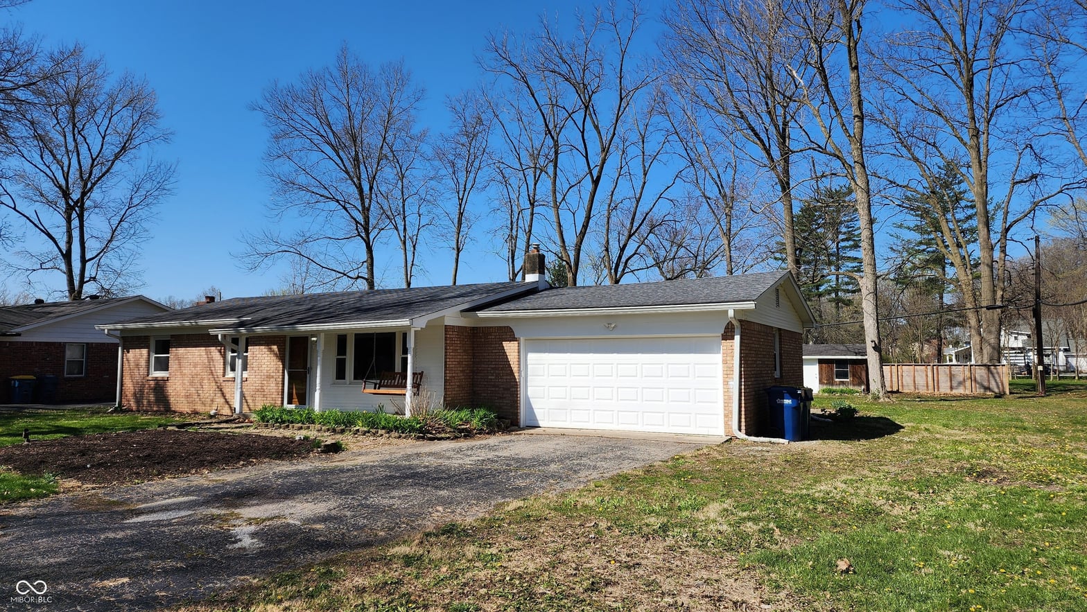 Front exterior at 9882 Woodbriar Lane, Carmel, IN