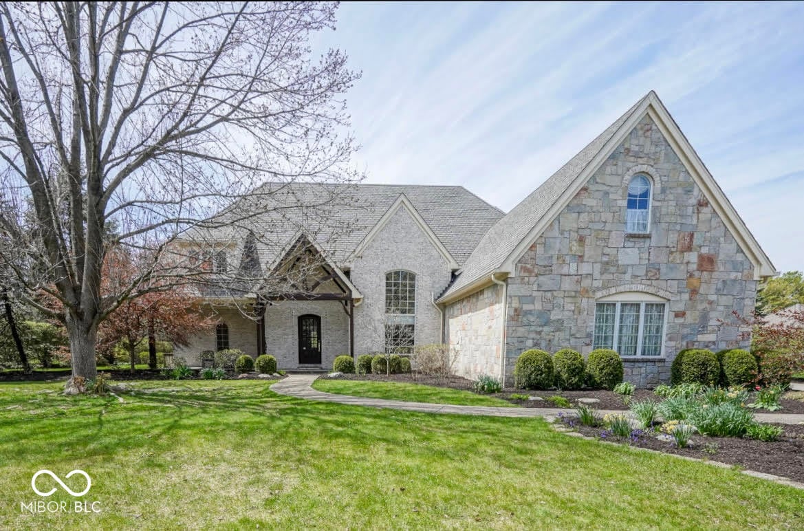 Front exterior at 10628 Walnut Creek Drive W, Carmel, IN