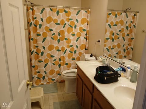 Primary bathroom at 5983 Clearview Drive, Carmel, IN — Spacious primary bath with dual vanity and ample storage.