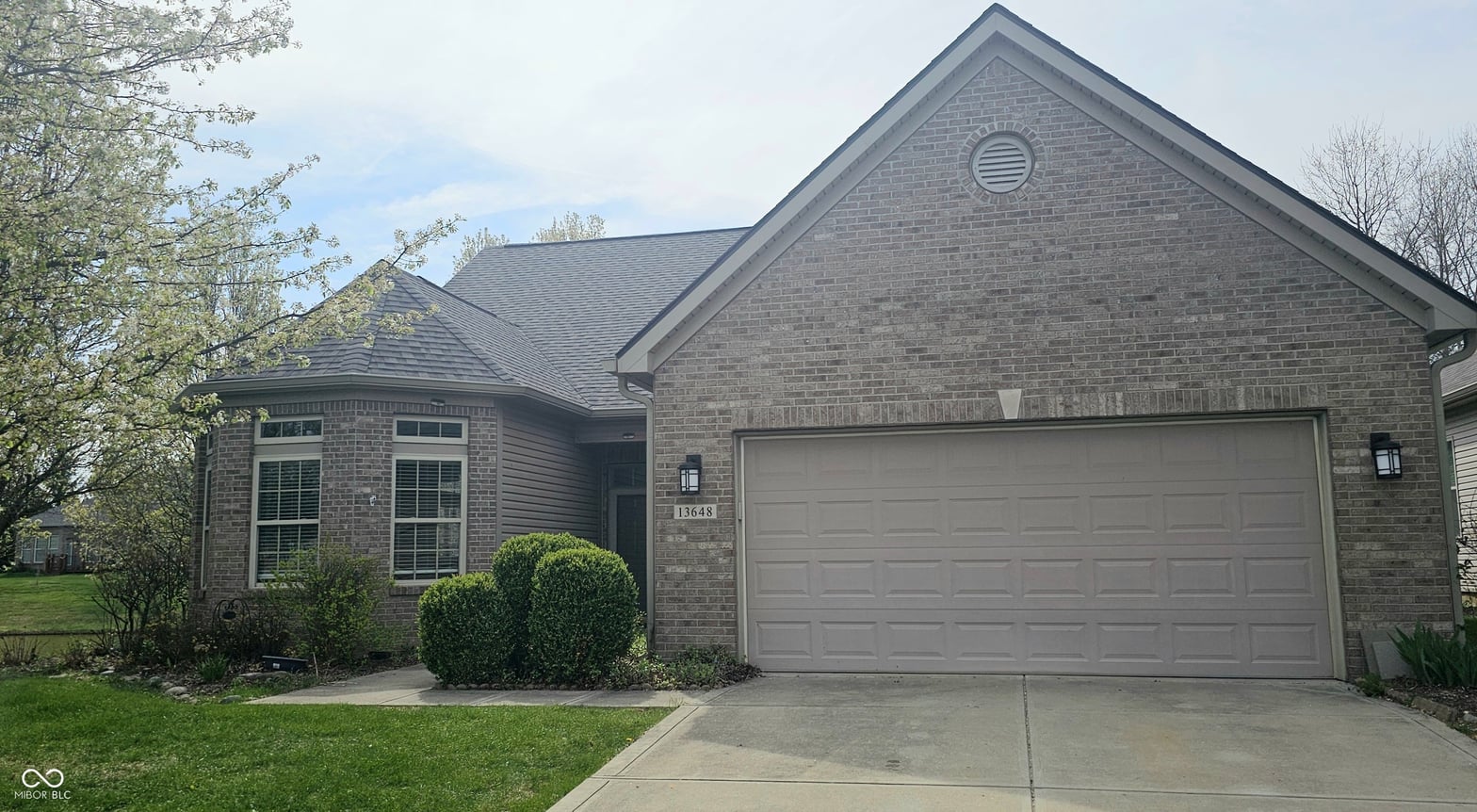Front exterior at 13648 Seven Oaks Drive, Fishers, IN