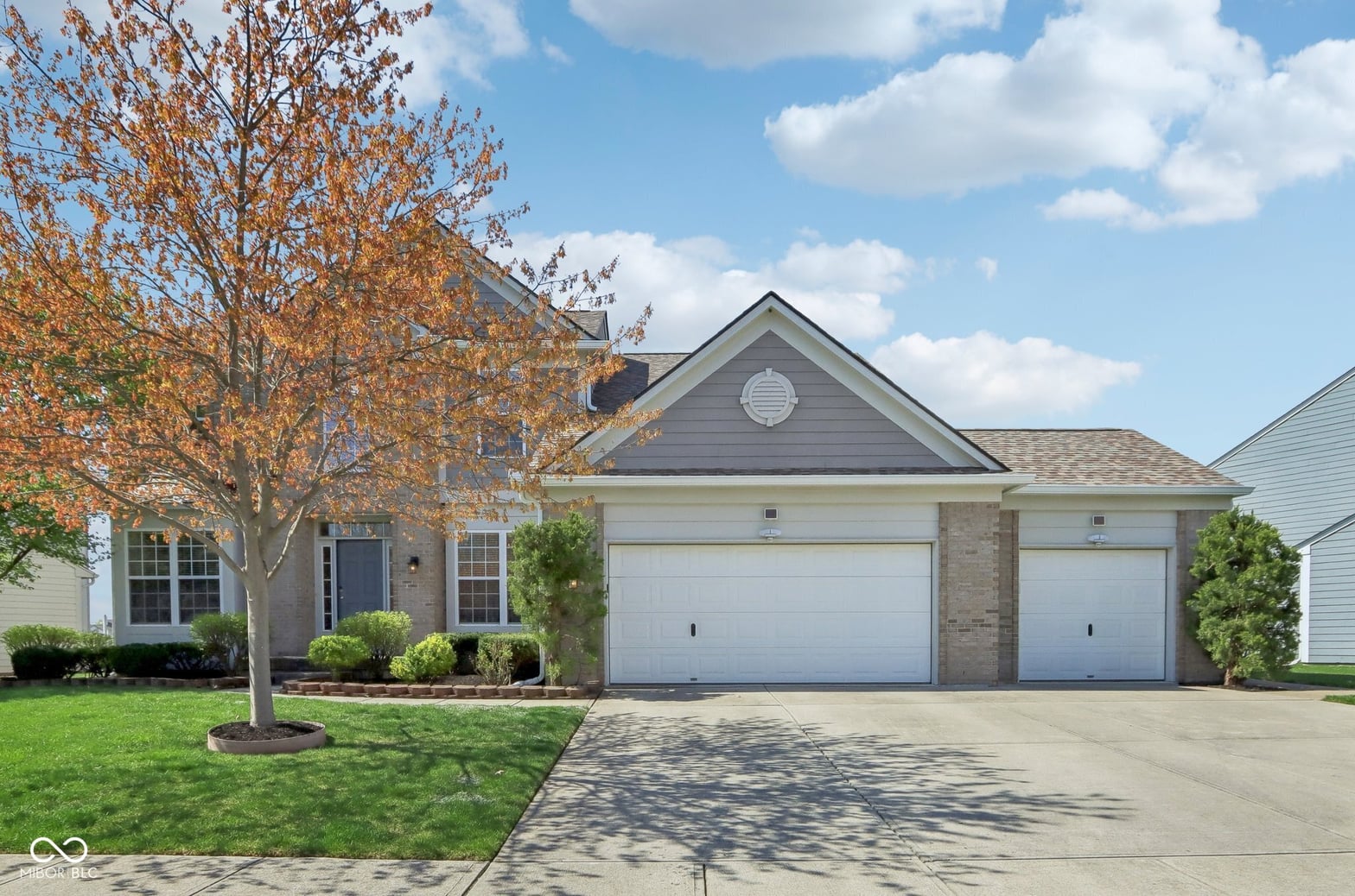 Front exterior at 14323 Chariots Whisper Drive, Carmel, IN