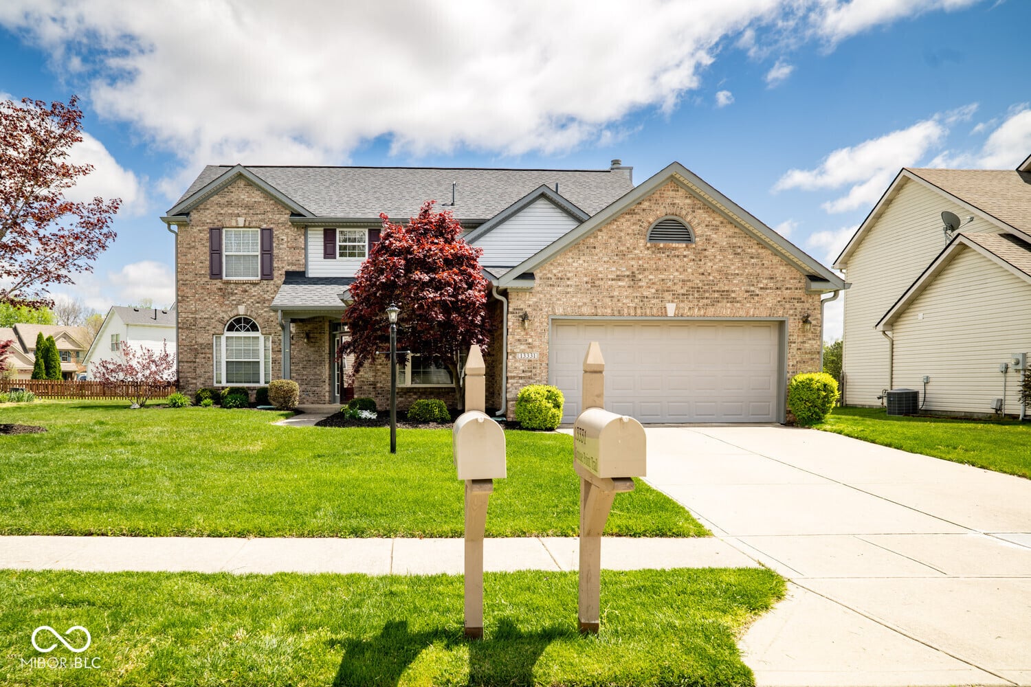 Front exterior at 13331 Grouse Point Trail, Carmel, IN
