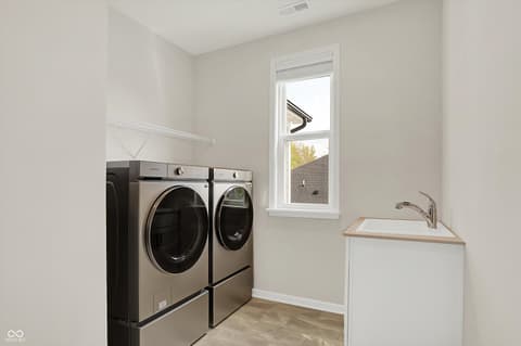 Laundry room at 14349 Marsdale Place, Carmel, IN
