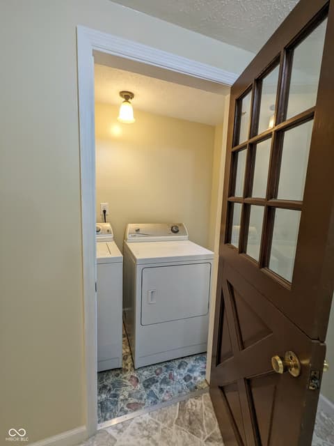 Laundry room at 243 S Grand Avenue, Connersville, IN