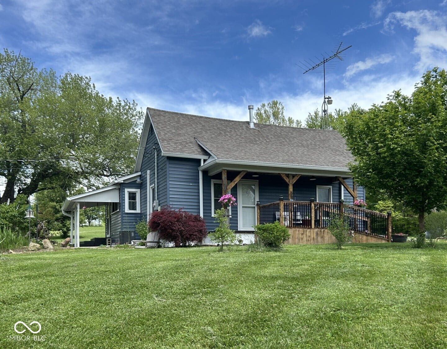 Front exterior at 8033 E Northshore Drive, Unionville, IN