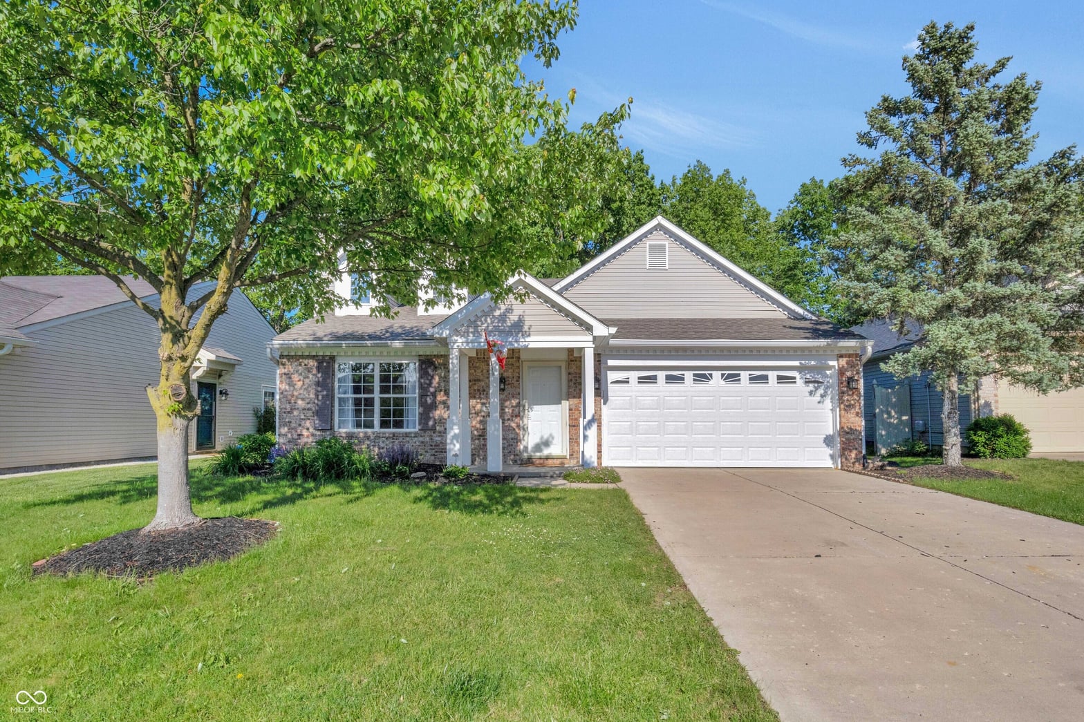 Front exterior at 9229 Crossing Drive, Fishers, IN
