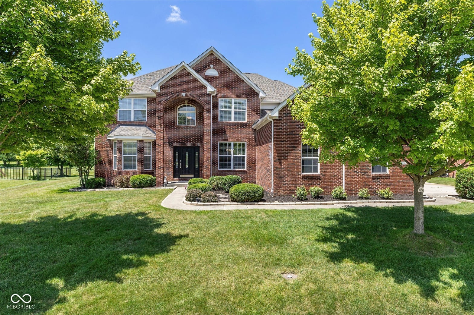 Front exterior at 12772 Tram Lane, Carmel, IN