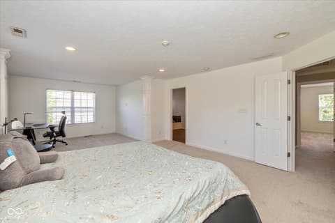 Primary bedroom at 12772 Tram Lane, Carmel, IN
