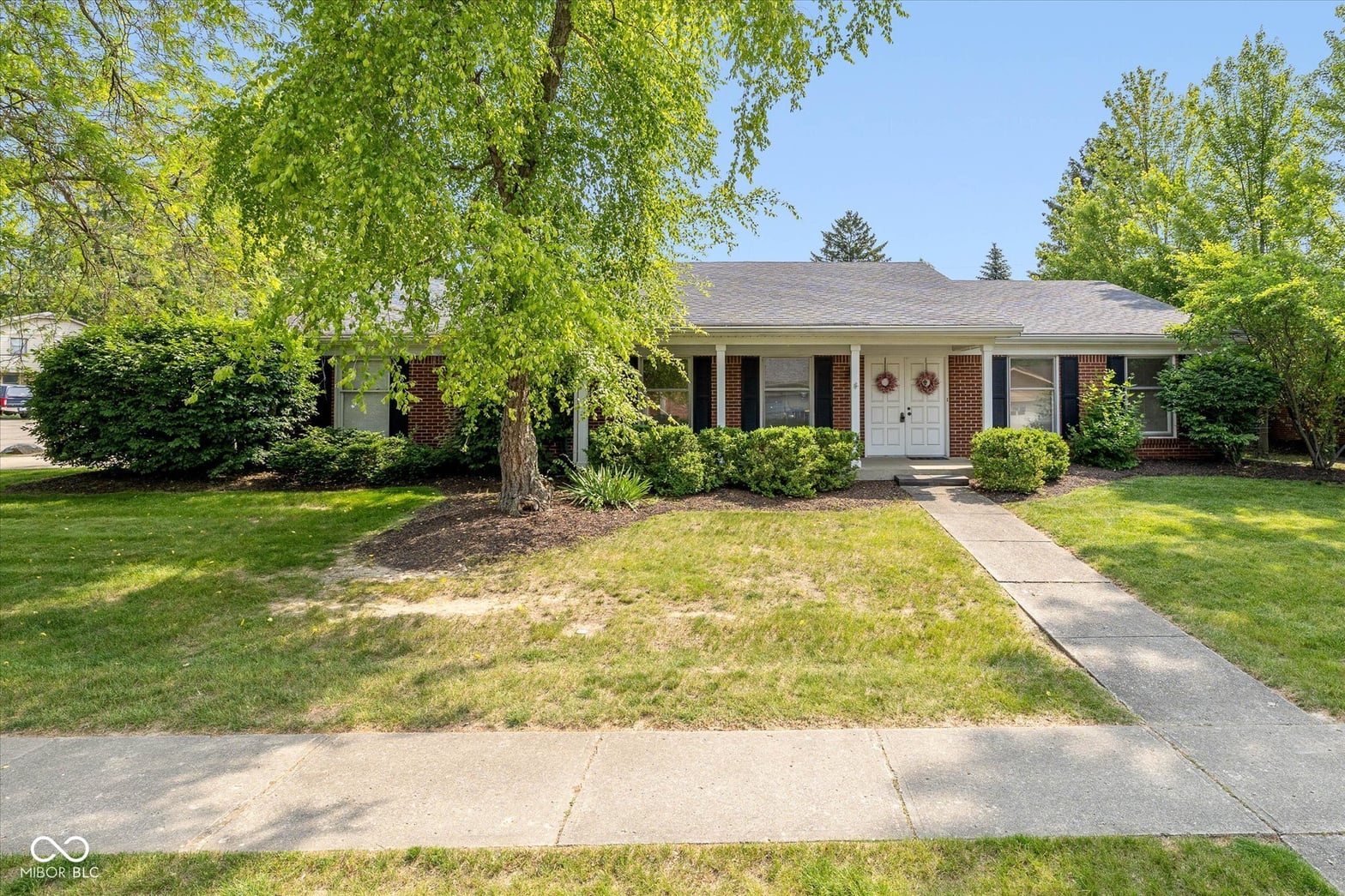 Front exterior at 311 Thornberry Drive, Carmel, IN