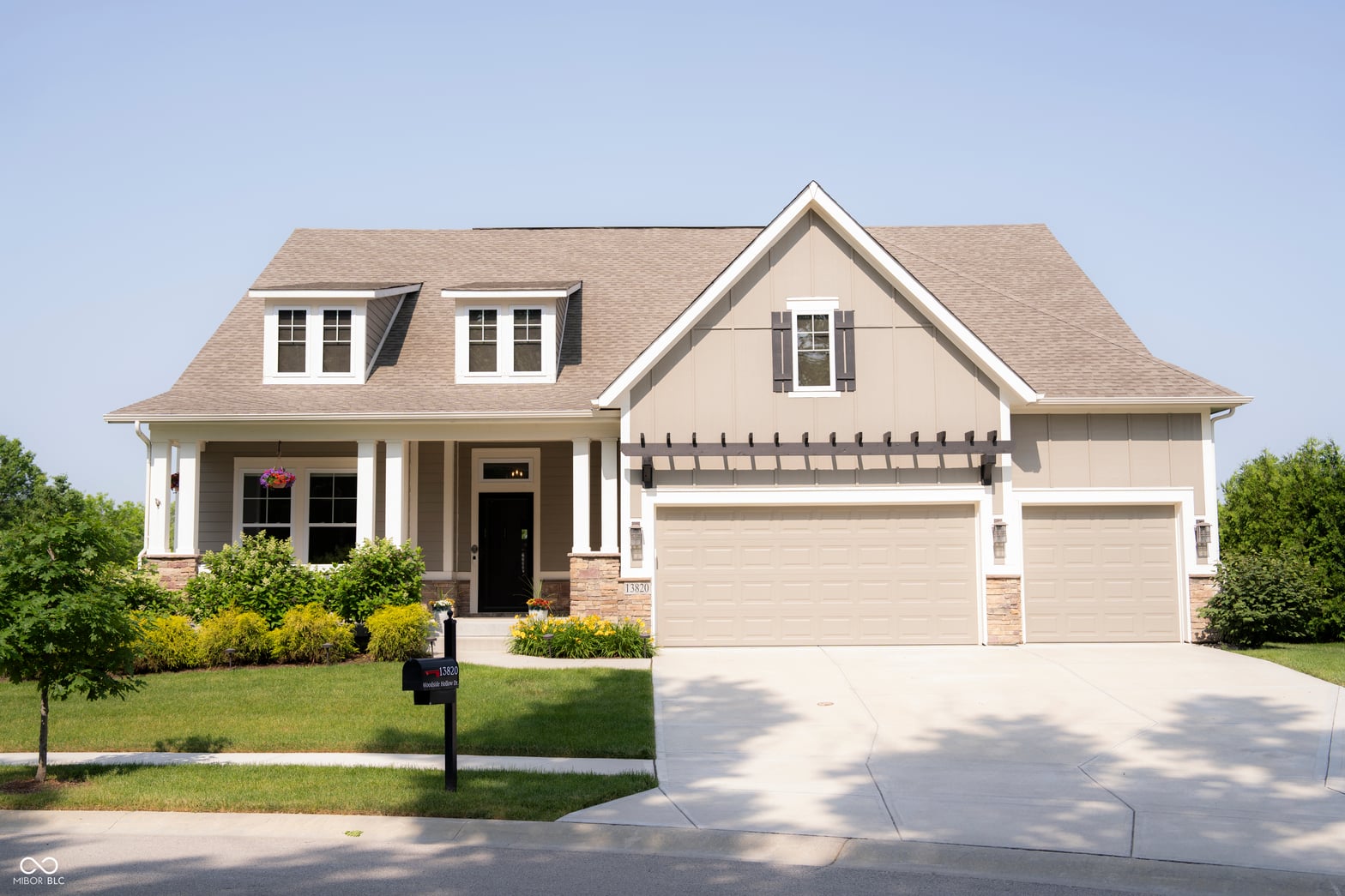 Front exterior at 13820 Woodside Hollow Drive, Carmel, IN