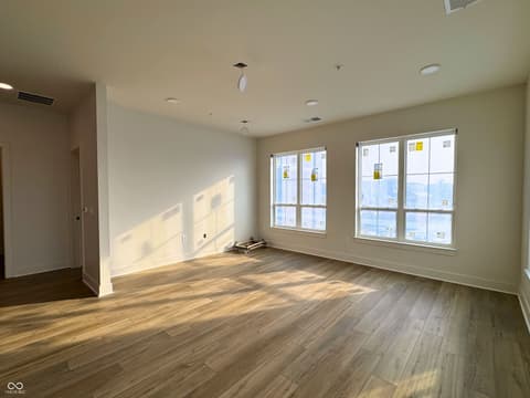 Living room at 925 Veterans Way, Carmel, IN — Bright, spacious living area with abundant natural light.