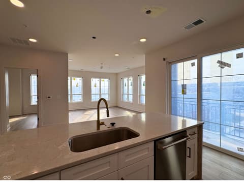 Kitchen at 925 Veterans Way, Carmel, IN — Stunning waterfront kitchen with panoramic views.