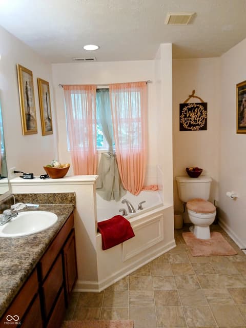 Primary bathroom at 8333 Pine Branch Lane, Indianapolis, IN
