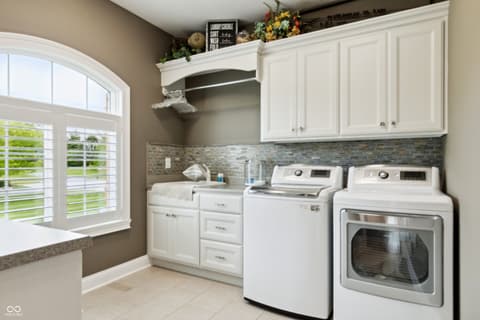 Laundry room at 3399 Nottinghill Boulevard, Plainfield, IN