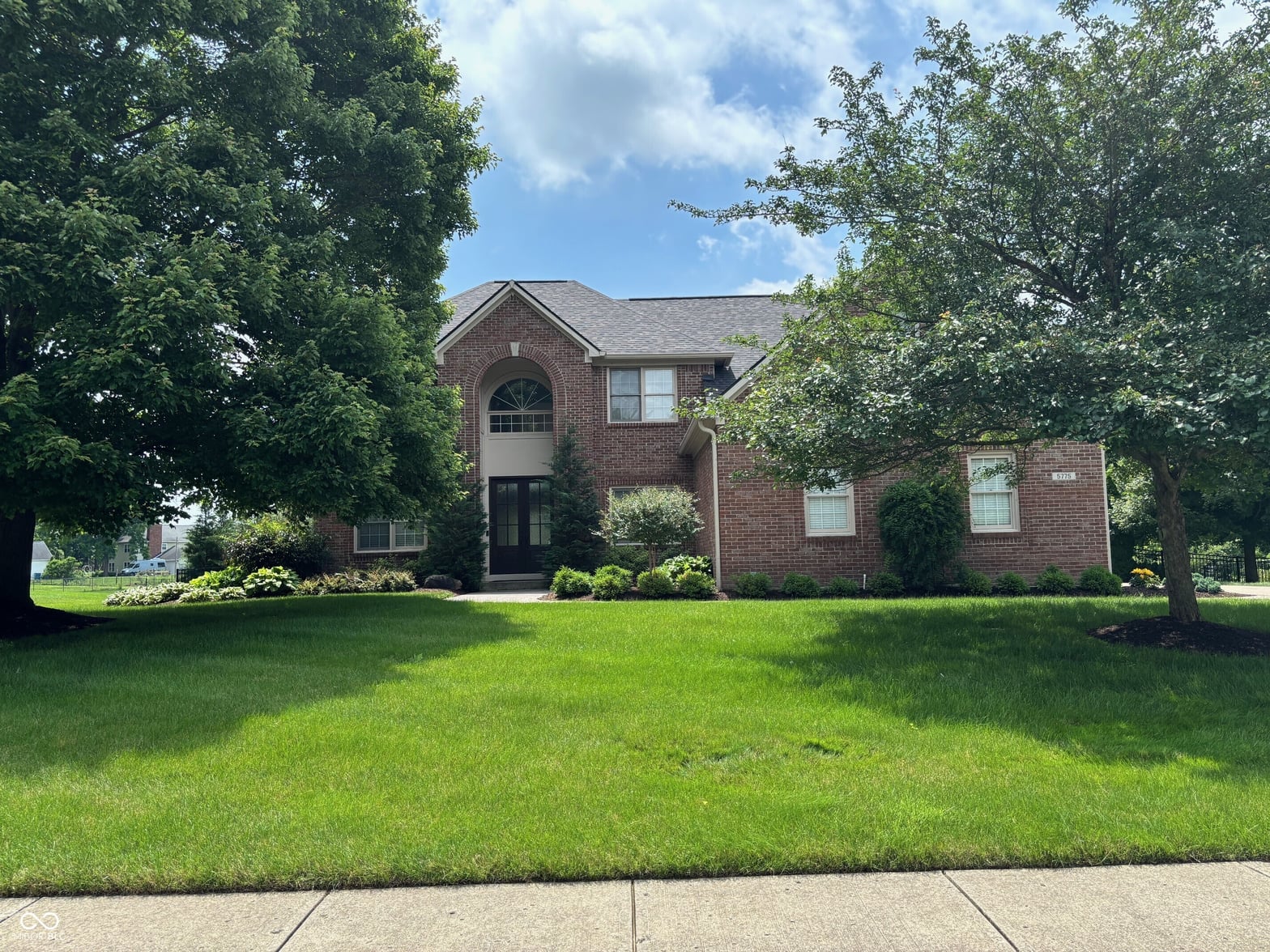 Front exterior at 5775 Coopers Hawk Drive, Carmel, IN