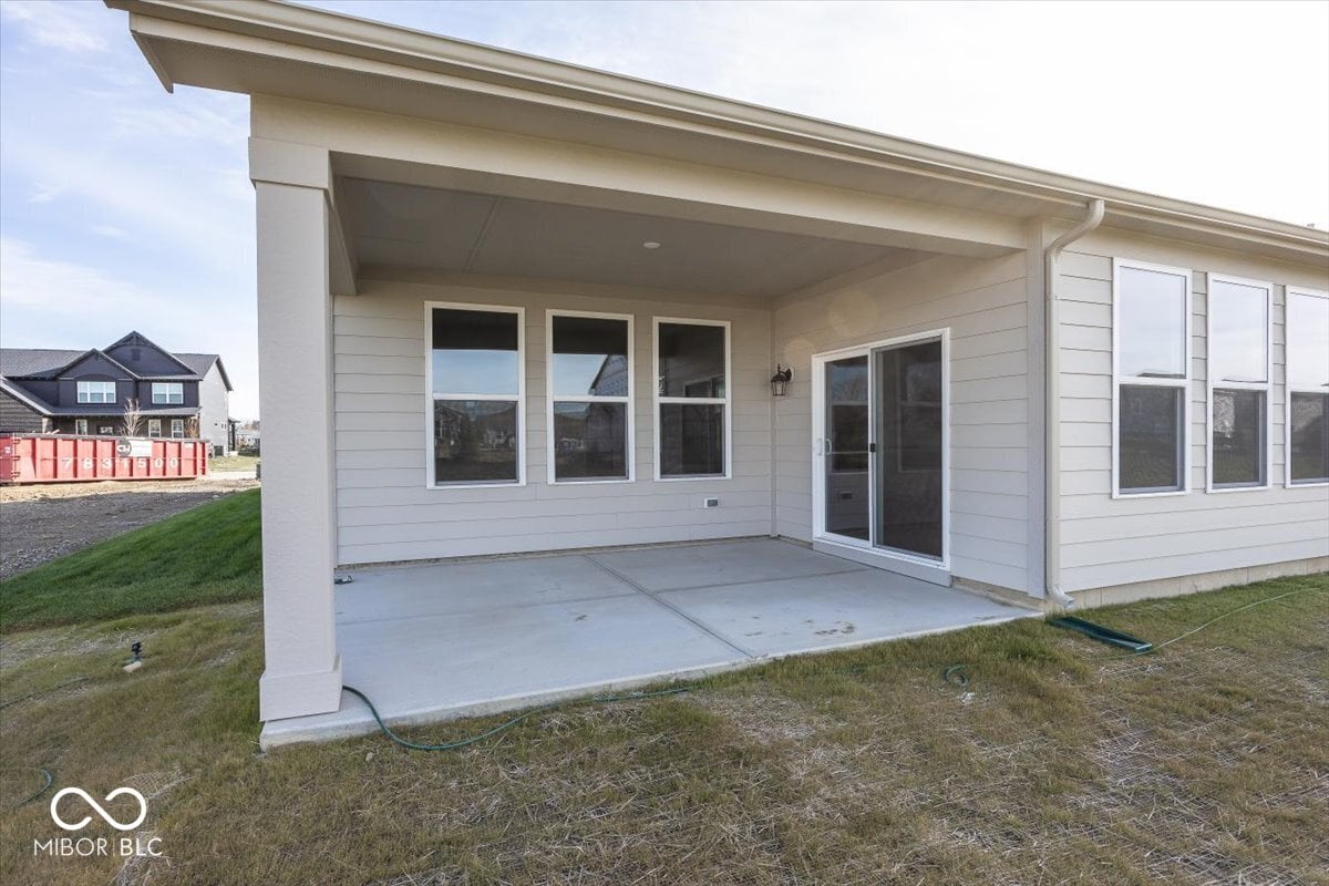 Spacious covered patio with mountain views and modern finishes.