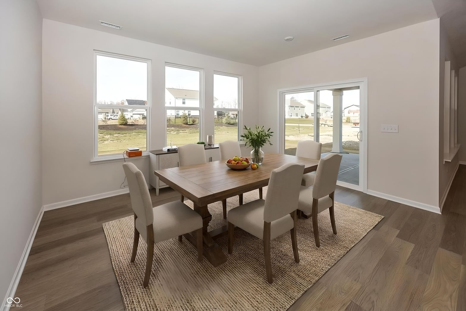 Bright contemporary dining room with abundant natural light.