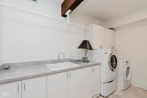Laundry room at 1616 W 116th Street, Carmel, IN