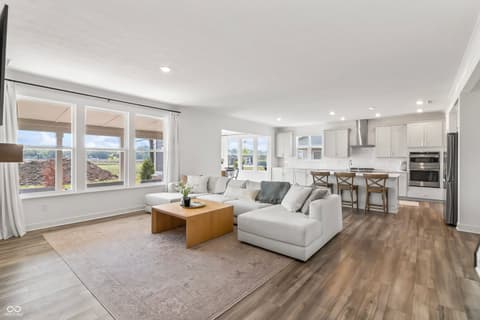 Living room at 1438 Chatham Hills Boulevard, Westfield, IN — Bright open-concept living with stunning panoramic views.