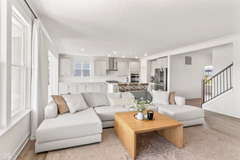 Living room at 1438 Chatham Hills Boulevard, Westfield, IN — Bright, open concept living space with modern finishes.