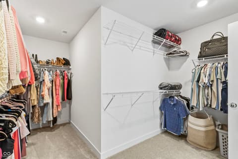 Closet at 1438 Chatham Hills Boulevard, Westfield, IN — Spacious walk-in closet with extensive organized storage.