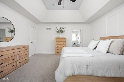 Primary bedroom at 2025 W Morse Drive, Cicero, IN — Bright primary suite with tray ceiling and modern finishes.
