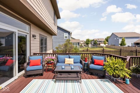 Outdoor living area at 2025 W Morse Drive, Cicero, IN — Spacious composite deck with comfortable outdoor seating.