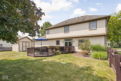 Backyard at 2025 W Morse Drive, Cicero, IN — Spacious backyard with composite deck and detached garage.
