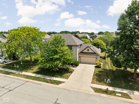 Front exterior at 2025 W Morse Drive, Cicero, IN — Well-maintained home on tree-lined suburban lot.