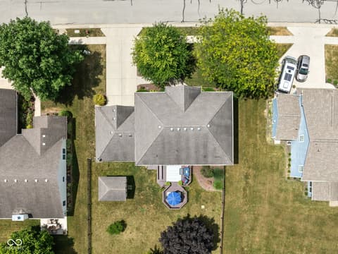 Aerial view at 2025 W Morse Drive, Cicero, IN — Spacious backyard with pool and mature trees.
