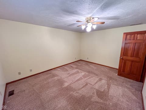 Primary bedroom at 5488 N German Church Road, Indianapolis, IN