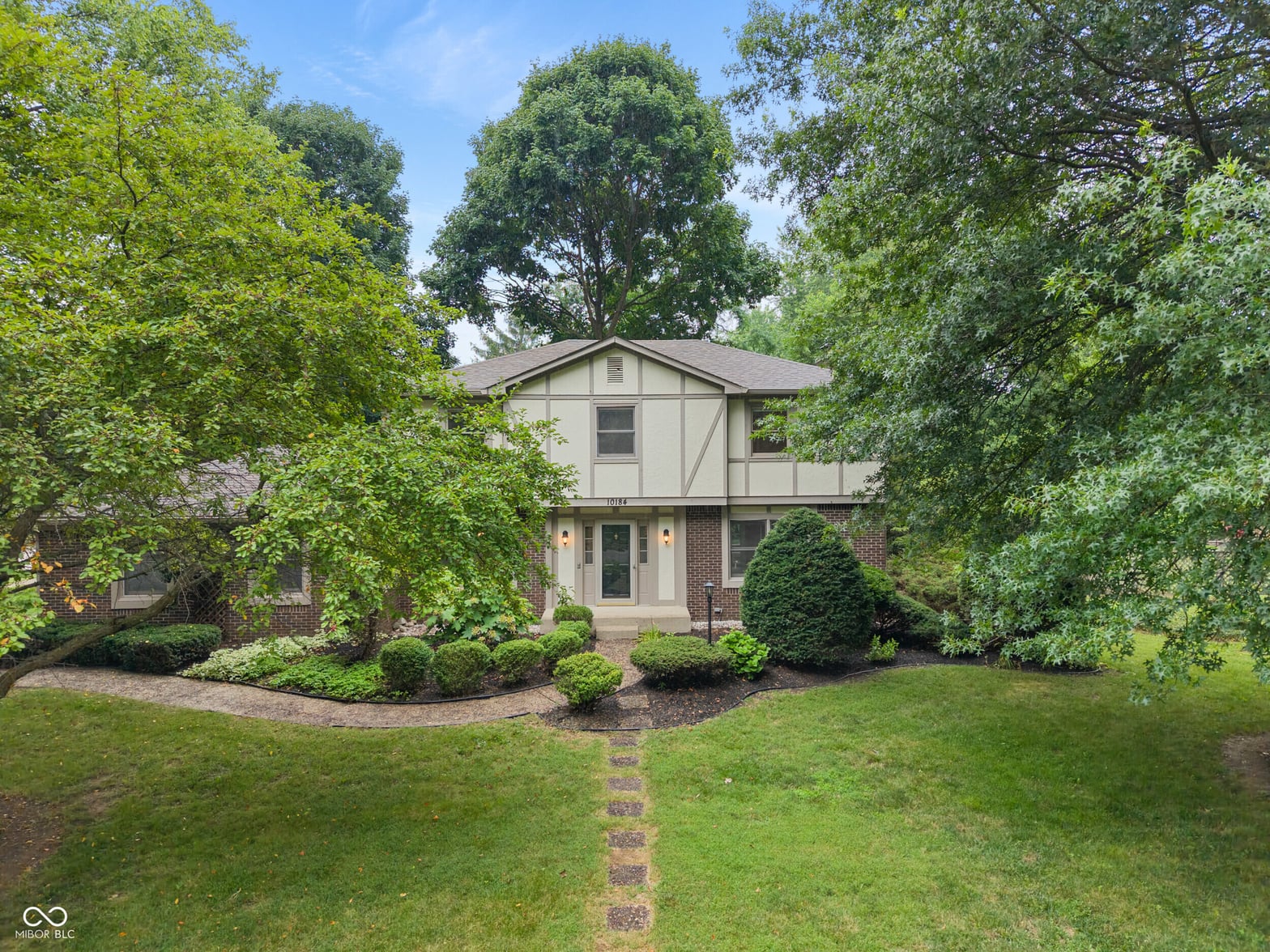 Front exterior at 10184 Lakeshore Drive E, Carmel, IN