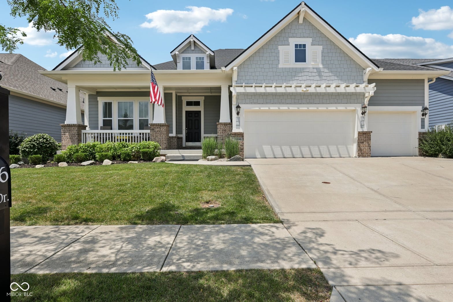 Front exterior at 13696 Woodside Hollow Drive, Carmel, IN