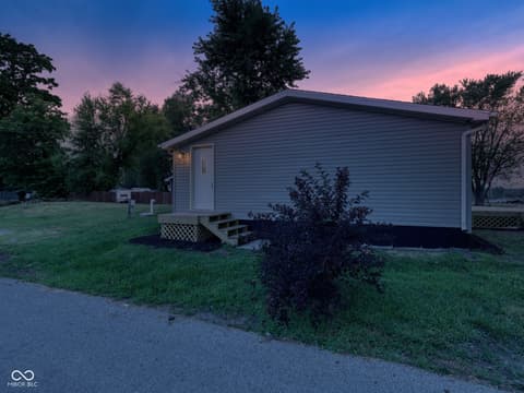 Side exterior at 650 S Wildwood Drive, Cromwell, IN