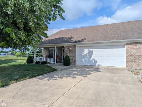 Front exterior at 230 Blue Ribbon Court, Rushville, IN