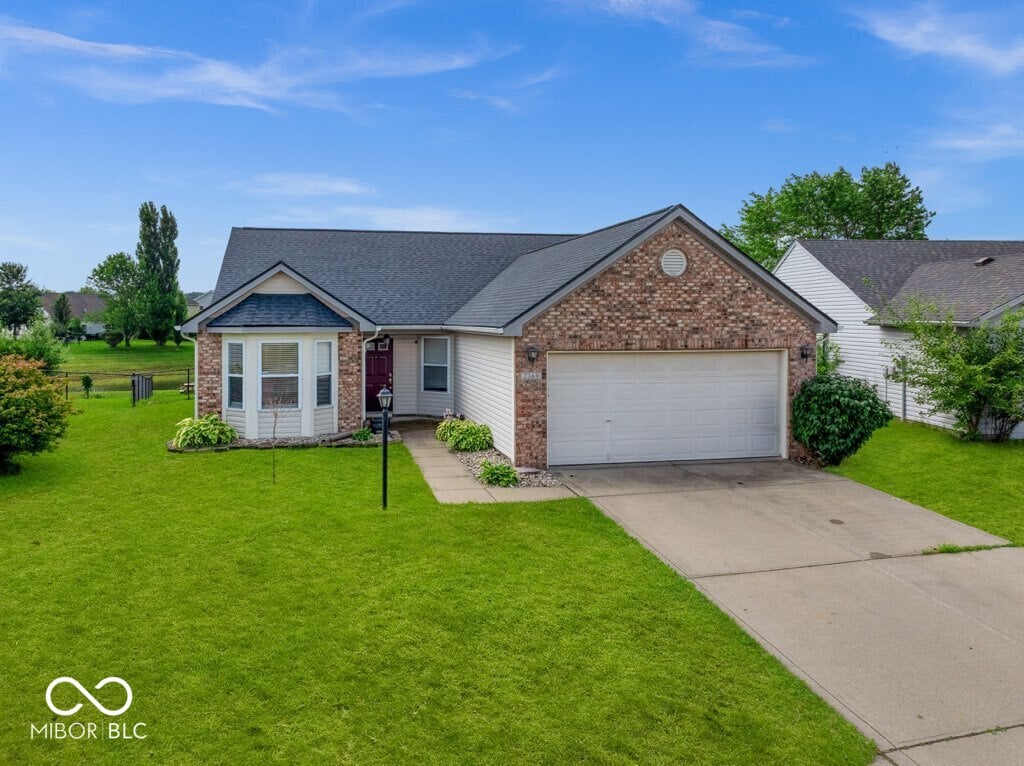 Front exterior at 2369 Orchard Creek Drive, Columbus, IN
