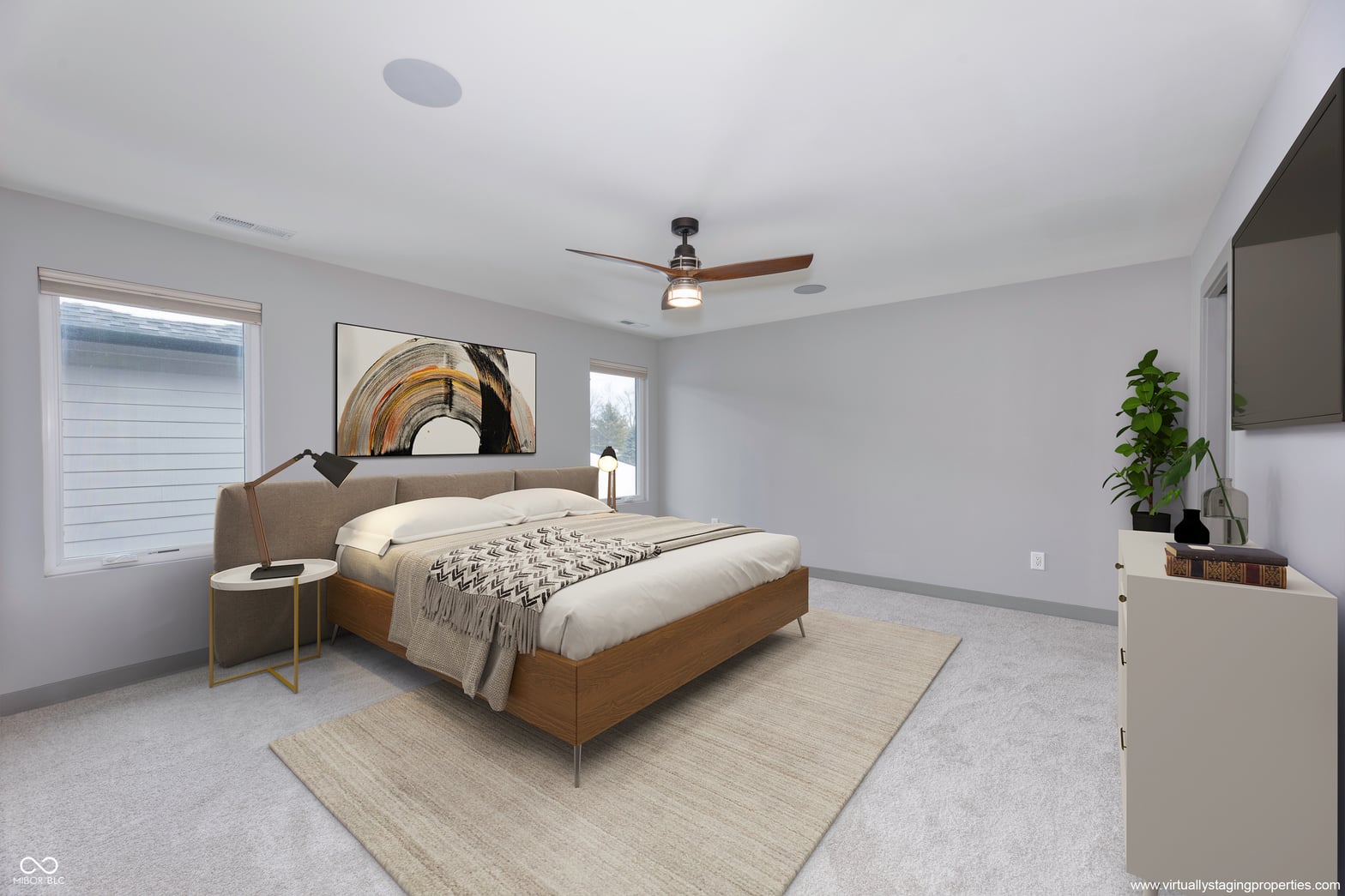 Spacious primary bedroom with modern finishes and natural light.