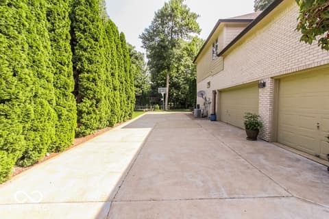 Side exterior at 7619 Oak Grove Drive, Indianapolis, IN