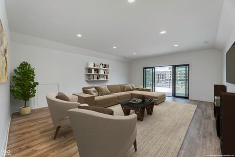 Living room at 8694 Morgan Drive, Fishers, IN — Bright modern living space with stunning city views.