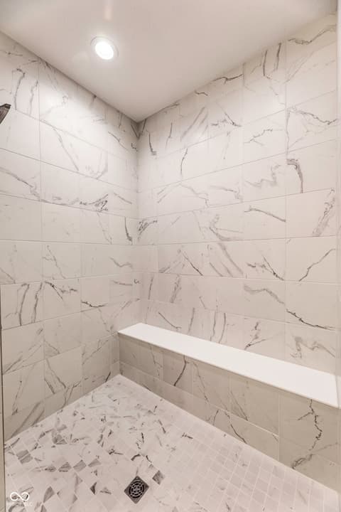 Primary bathroom at 14890 E Keenan Circle, Westfield, IN — Luxurious marble shower with spa-like finishes