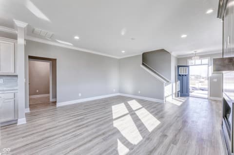 Living room at 14890 E Keenan Circle, Westfield, IN — Bright, open-concept living space with modern finishes